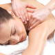 Close-up of a young woman receiving back massage at spa