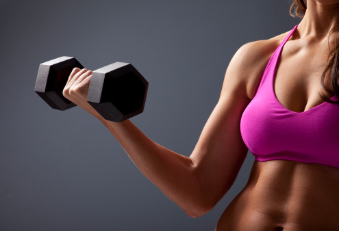 Woman Lifting Dumbbell