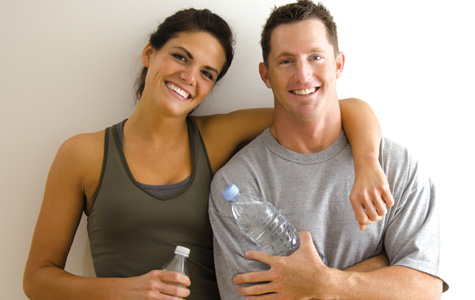 Woman and man in gym