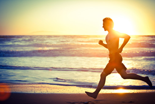 Man running on beach