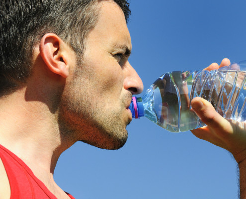 man drinking water