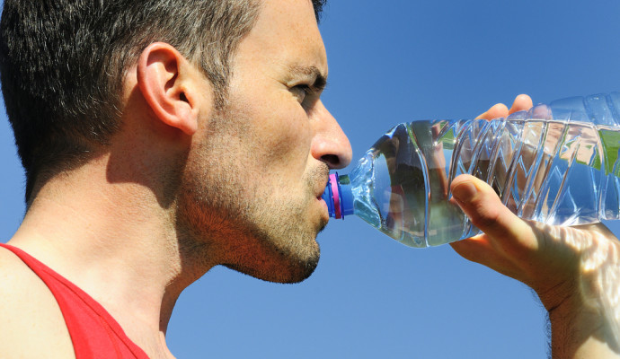 man drinking water